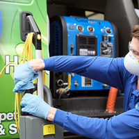 Chem-Dry Franchise employee cleans equipment