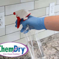Chem-Dry cleaning franchise spray bottle used to clean tile